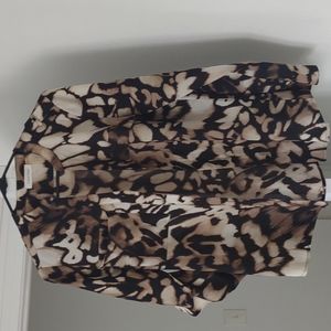 Calvin Klein dress shirt, the sleeves have straps for rolling them up.